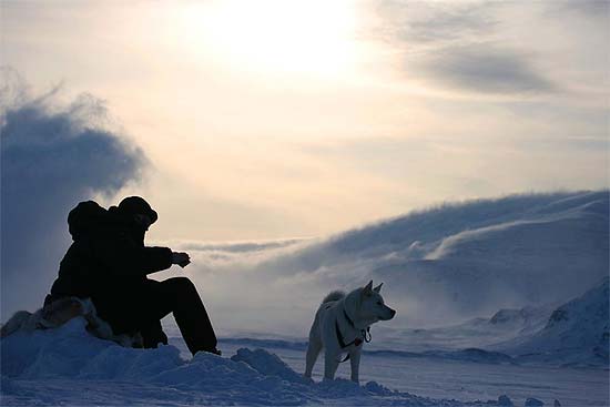 Isfisker og hund i Dividalen